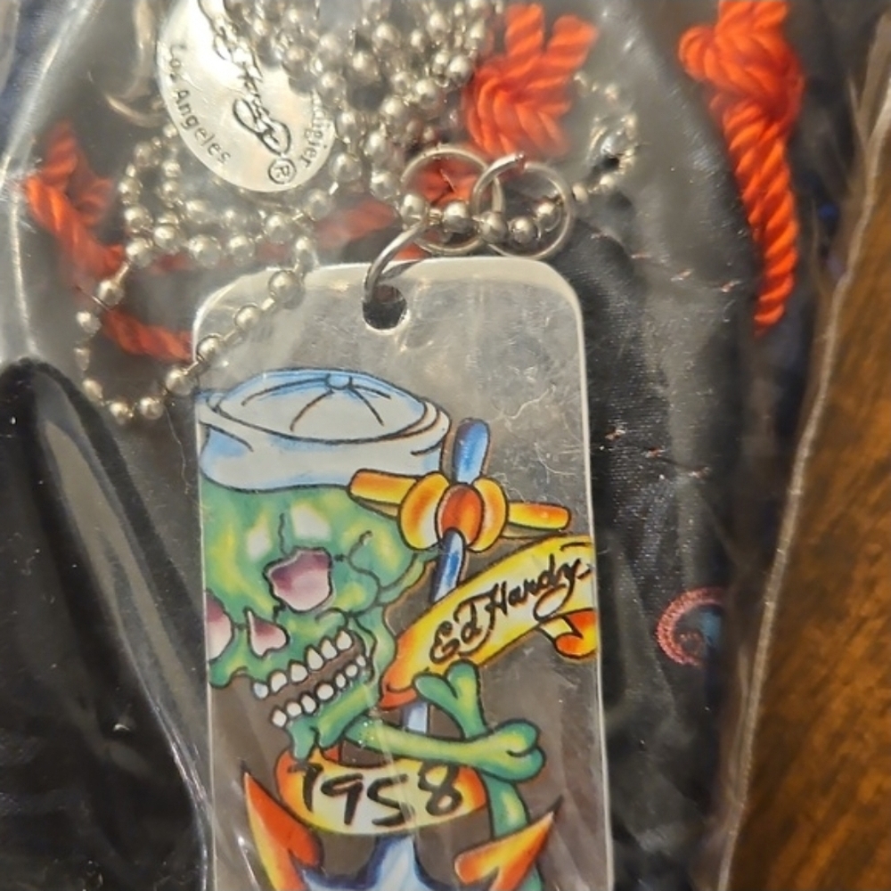 Ed Hardy Multicolor Skull Tag Necklace with Orange Cord Accents